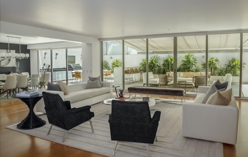 two black chairs in a living room